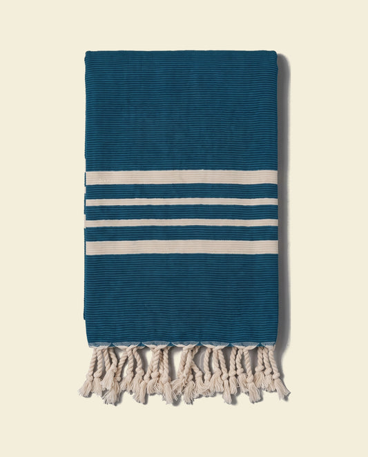 gastendoek Krem Sultan petrol blue - op kleur