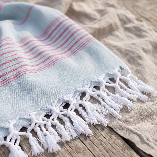 hammamhanddoek dun zeegroen/cerise - detail