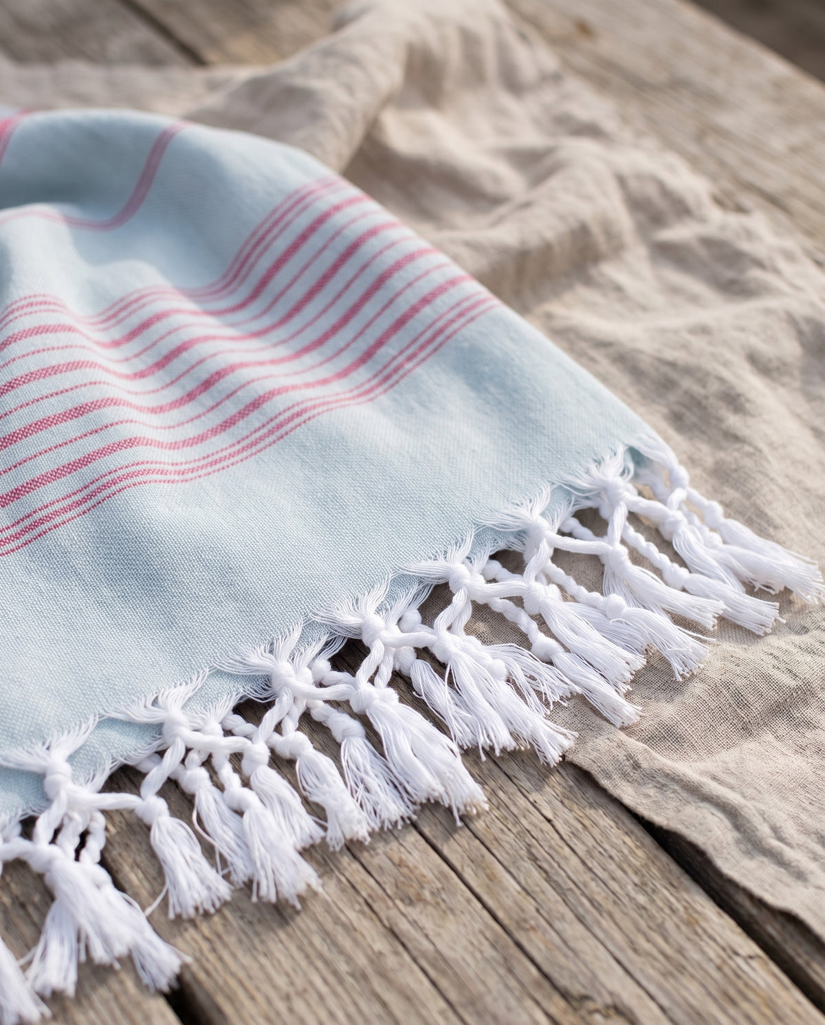 hammamhanddoek dun zeegroen/cerise - detail
