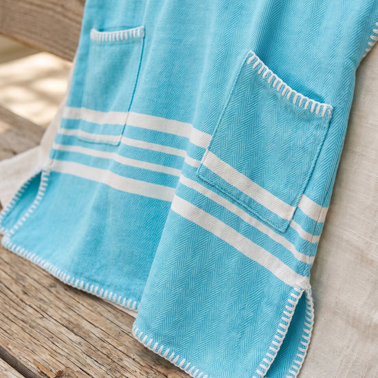 kinder strandponcho hamam turquoise - detail