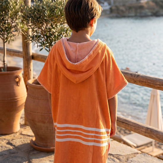 kinder strandponcho orange - sfeer