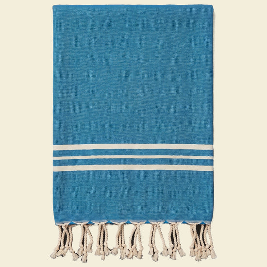 kleine hamamdoek Krem Sultan petrol  blue - op kleur