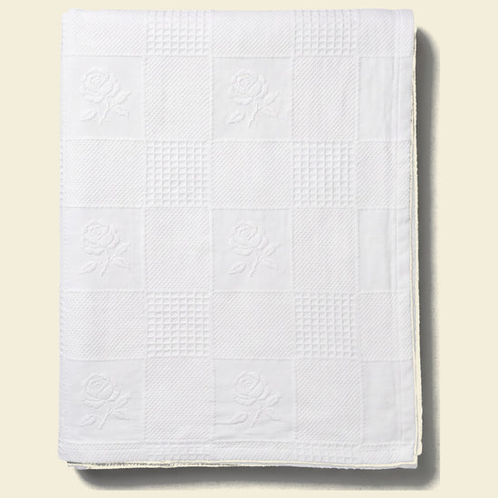 pique bedsprei wit geruit met rozen - op kleur